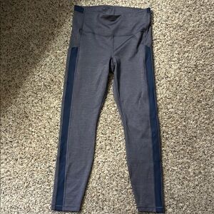 Athleta Gray Ultimate Leggings with blue stripe. Ultimate stash pocket.